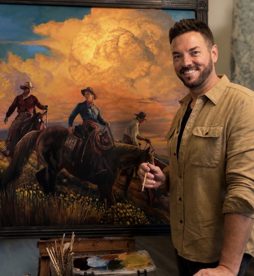 Artist Matthew Trammel beside his painting Chasing Daylight