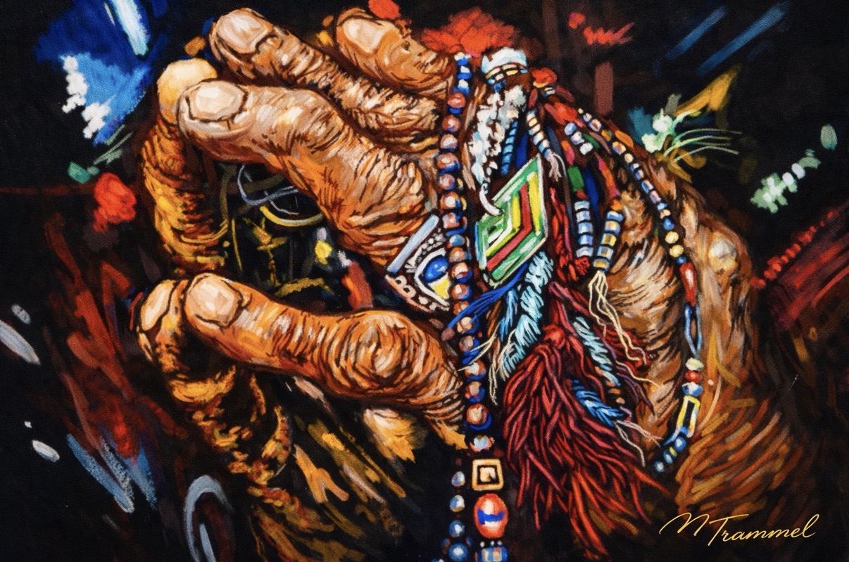 Weathered hands holding colorful Native American beadwork and feathers